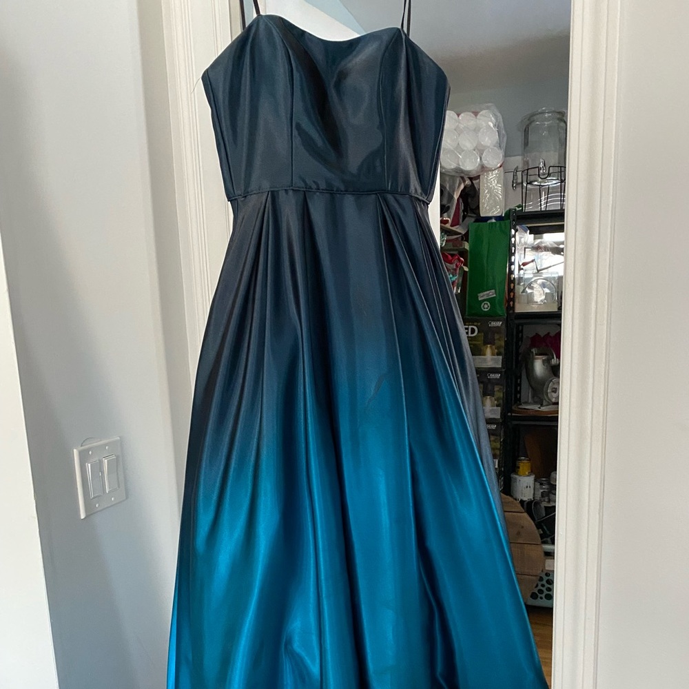 Prom/Grad dress worn once. Is great shape strapless, blue ombré.
